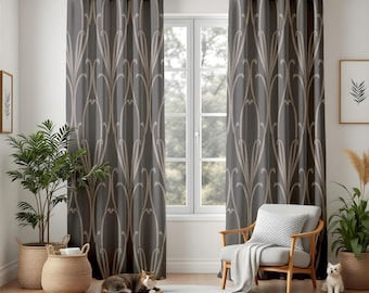 May include: Gray window curtains with a beige floral pattern hang in front of a window. A wooden chair with a white pillow and blanket sits in front of the window. A cat and a small dog are on the floor.