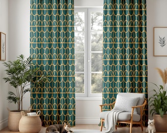 May include: Teal and gold geometric patterned curtains hanging in front of a window. The curtains have a repeating design of interlocking shapes. The room also features a wooden chair, plants in woven baskets, and a cat lying on a white rug.