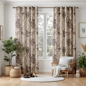 May include: A pair of floor-length curtains featuring a repeating dark brown floral and vine pattern on a light beige background. The curtains are hung on a dark metal rod with grommets at the top, framing a central window with a view of trees.