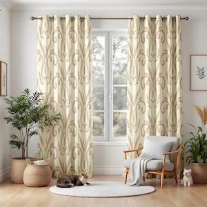 May include: Cream-colored curtains with a repeating, stylized floral pattern in a light brown hue. The curtains hang from a dark metal rod, framing a window. A cat rests on a white rug in front of the window, with a chair and plants nearby.