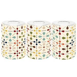 May include: Three cylindrical candle holders with a cream-colored background and a repeating floral pattern in red, blue, yellow, and brown. The top of each holder is silver.