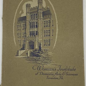 May include: A vintage book cover featuring a detailed illustration of a large building with towers and arched windows. The text reads "Woman's Institute of Domestic Arts & Sciences, Scranton, Pa." and "Embroidery and Decorative Stitches."