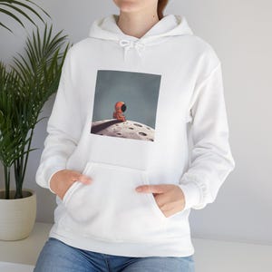 Sudadera unisex de explorador cósmico, inspirada en el espacio, con diseño de astronauta, ideal para amantes del espacio, ropa informal y acogedora.