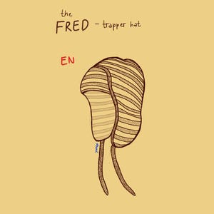 May include: A brown and tan striped trapper hat with ear flaps and two dangling ties. The illustration features the text 'the FRED - trapper hat' and 'EN' in red. The design shows a textured, knit-like pattern throughout the entire hat structure.