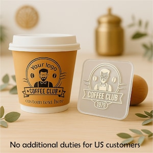May include: A coffee cup and coaster set with a Coffee Club logo. The cup is tan with a white lid and the logo features a cartoon man with glasses. The coaster is square and translucent with the same logo.