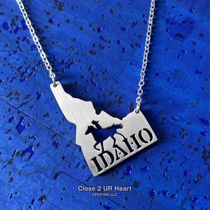 Collier de cavalier carte de l'État de l'Idaho par Close 2 UR Heart