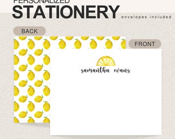 May include: Personalized stationery set with a lemon theme. The front of the card features the name "samantha evans" and a lemon slice graphic. The back of the card has a pattern of yellow lemons. The stationery measures 4.25 x 5.5 inches.