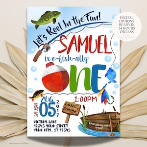 May include: A blue, green, and red birthday invitation for a boy's first birthday party. The invitation features a cartoon fish, a fishing rod, and a bobber. The text on the invitation reads "Let's Reel In the Fun! Samuel is o-fish-ally one. Aug. 05, 2017, 1:00PM. Victory Lake, 12345 Your Street, Your City, ST 12345. RSVP: 222.333.4444 by 8.1.17."