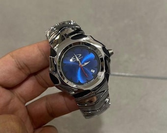 Oakley Timebomb Style X-Metal Blue Dial Watch – Futuristic Polished Stainless Steel Bracelet, Date Display, Custom Collector’s Edition