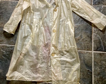 white plastic raincoat