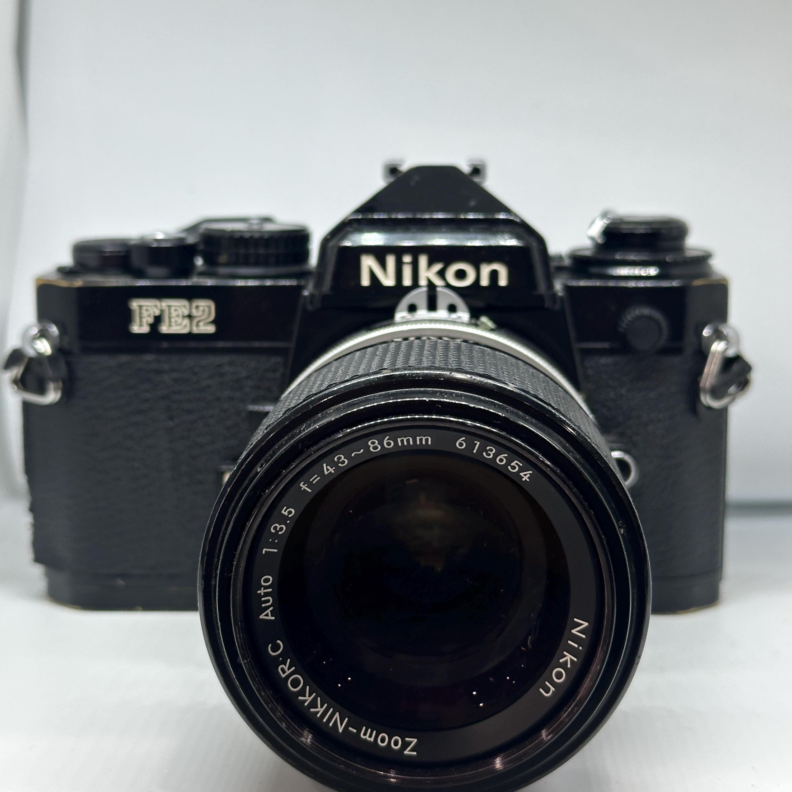 L Nikon FE2 35mm SLR Camera, Zoom-nikkor.c 43-86mm Lens, Tested