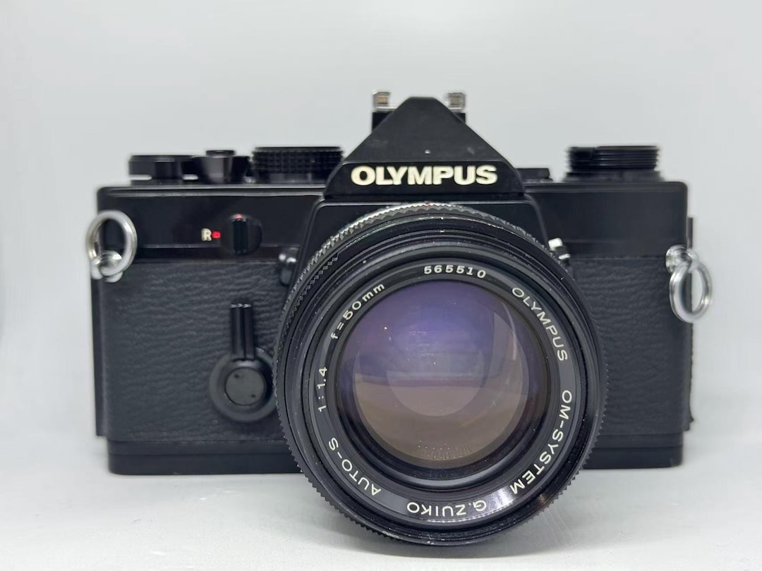 L Olympus OM-1 35mm Film Camera W/ G.zuiko 50mm F/1.4 Lens (O