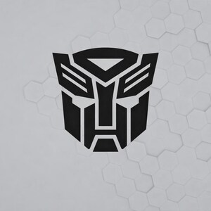 Sick Carbon Fiber Autobot Emblem For Your Ride – Transformers Badge (Red/Black)