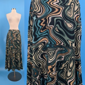 May include: A long black skirt with a swirling abstract pattern in shades of teal, orange, and white.