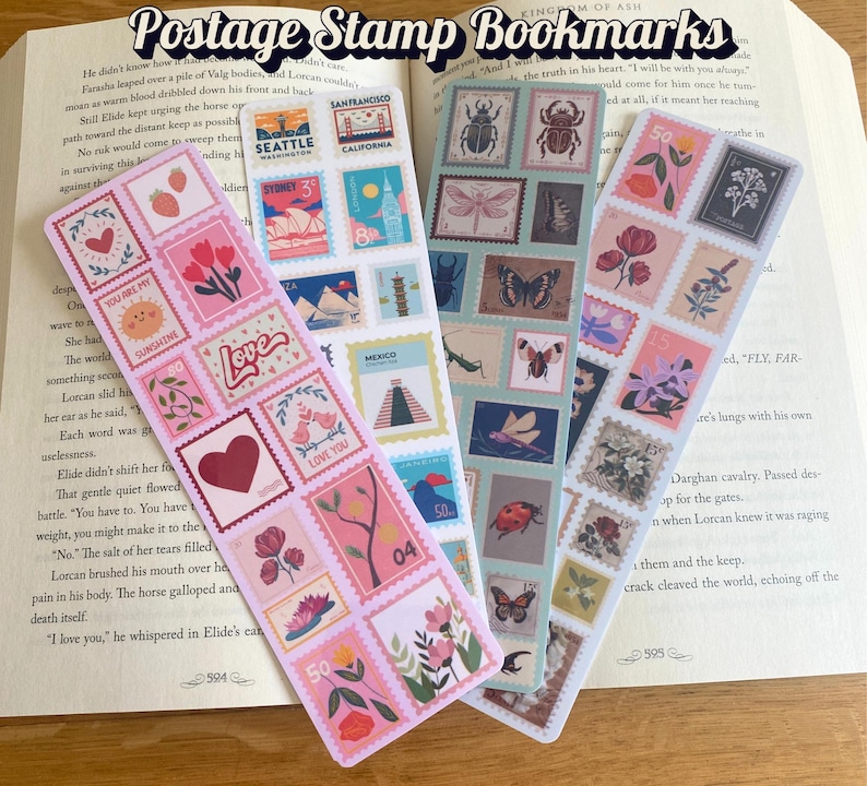 May include: Four decorative bookmarks featuring postage stamp designs with floral, heart, and travel motifs. The bookmarks are displayed on an open book, with the text "Postage Stamp Bookmarks" visible at the top.