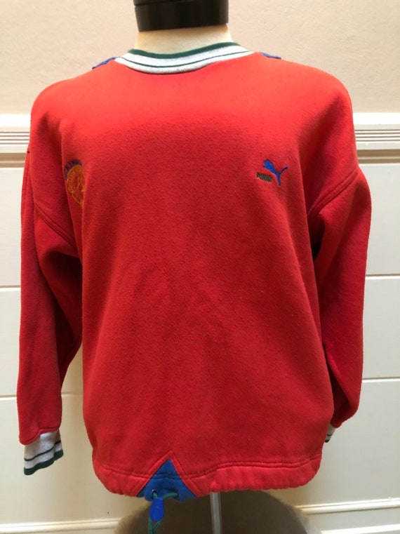 red puma sweater