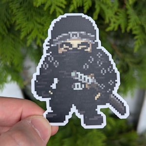 Pegatina de vinilo UV de píxeles de Ghost of Tsushima / Calcomanía impermeable de Jin Sakai para portátil, botella de agua, cuaderno y funda de teléfono / Arte de fan del juego Samurai