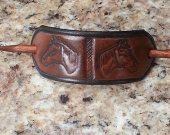 Leather Pony Tail Stick Barrette with Horse Heads Stamped on it. Good for man bun or men's pony tail