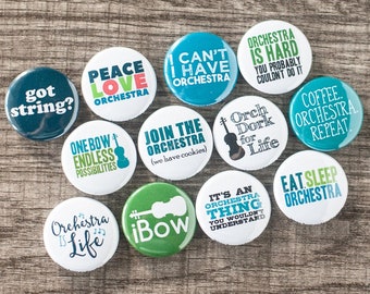 May include: Twelve round buttons with various sayings about orchestra, including "Peace Love Orchestra", "Got String?", "One Bow Endless Possibilities", "I Can't I Have Orchestra", "Join the Orchestra (we have cookies)", "Orchestra is Hard You Probably Couldn't Do It", "Orch Dork for Life", "It's an Orchestra Thing You Wouldn't Understand", "Coffee Orchestra Repeat", "Eat Sleep Orchestra", "iBow", and "Orchestra is Life".