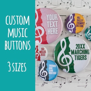 May include: Custom music buttons with a treble clef design. The buttons are available in three sizes and feature different text, including "Your Text Here", "ISU Mellos 20XX", "Shermer High Band Boosters", "Hill Valley Trumpet Section", and "20XX Marching Tigers".