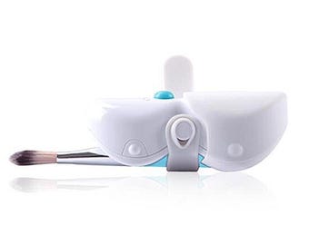 May include: A white makeup brush with a blue and white retractable case. The brush is made of soft bristles and is designed for applying makeup.