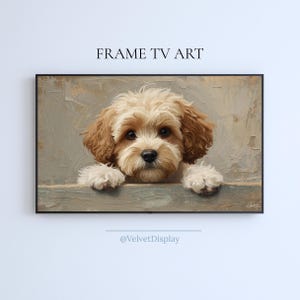 May include: A framed digital art print featuring a charming dog with light brown and white fur. The dog is peeking over a ledge, with the text "FRAME TV ART" at the top. The artist's signature is in the bottom right corner.