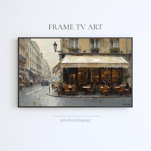 May include: An oil painting of a Parisian cafe scene. The artwork depicts a cafe with a cream-colored awning, outdoor seating, and patrons. The buildings in the background are a light yellow color. The words "FRAME TV ART" are at the top of the image.