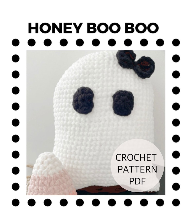 May include: Crochet pattern PDF for a white ghost with black eyes and a brown bow. The ghost is sitting on a pink and white crocheted base.