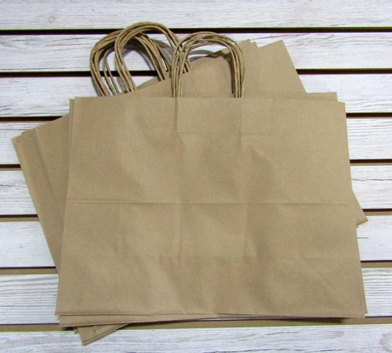Gift bags 8X4X10 HANDLES NEW LOT OF 50 Newsprint Paper Paper Shopping