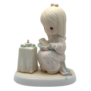 1984 Precious Moments Figurine – “May Your Christmas Be Blessed” by Enesco, E-5376