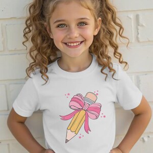 Pink Bow Pencil T-Shirt: Back To School Teacher Student Graphic Tee