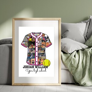 May include: Framed print featuring a baseball jersey design. The jersey is filled with action shots and has a pink and white trim. A yellow softball is at the bottom. The text reads "JORDAN WILLIAM Your high school."