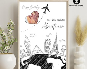 Può includere: Stampa in bianco e nero incorniciata con le parole "Happy Birthday" e "Für dein nächstes Abenteuer". L'opera presenta un cuore con una banconota in euro, un aereo e monumenti mondiali come la Torre Eiffel e il Big Ben.