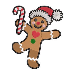 May include: A brown gingerbread man with a red heart and green circle, wearing a red Santa hat with white trim, and holding a red and white striped candy cane. The gingerbread man has black eyes and a smiling mouth.