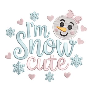 May include: An embroidered design with the text "I'm Snow Cute" in light blue and pink. The design includes a smiling snowman with a pink bow, snowflakes, and pink hearts, all on a white background.