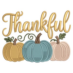 May include: Embroidered design featuring the word "Thankful" in gold script above three pumpkins. The pumpkins are in shades of gold, teal, and pale pink, with green vines and leaves. A fall-themed design.