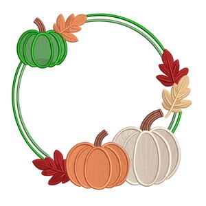 May include: An embroidered design featuring a green pumpkin, an orange pumpkin, and a white pumpkin, along with fall leaves. The pumpkins and leaves are arranged around a double green circle, creating a seasonal frame.
