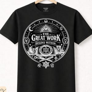 May include: Black t-shirt with a white graphic design. The design includes the text "THE GREAT WORK BEGINS WITHIN" and various symbols, including a skull, an eye, and an hourglass. Made from premium cotton.