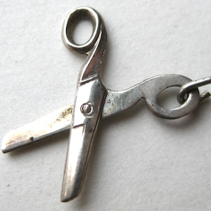 May include: A set of three ceramic mugs with a speckled, matte finish. The mugs are in shades of cream, light gray, and dark gray. Each mug has a simple, minimalist design, perfect for coffee or tea.