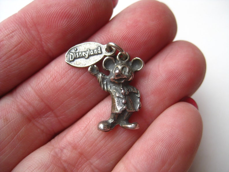 May include: A rustic wooden sign with the text "Welcome to our home" in a handwritten style. The sign features a distressed finish and a simple, inviting design, perfect for a front porch or entryway.