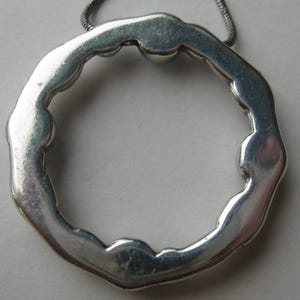 May include: A rustic wooden sign with the text "Welcome to our home" in white lettering. The sign features a distressed finish and a simple, inviting design, perfect for a front porch or entryway.