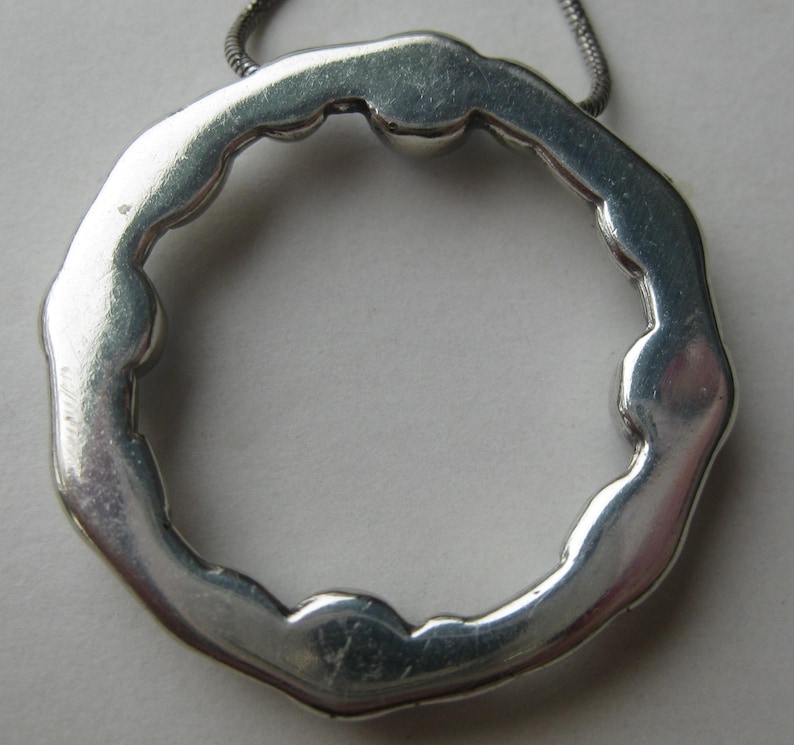 May include: A rustic wooden sign with the text "Welcome to our home" in white lettering. The sign features a distressed finish and a simple, inviting design, perfect for a front porch or entryway.