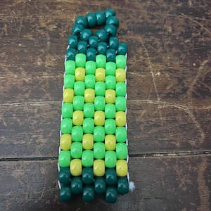 green and yellow keychain