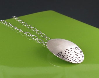 Small Sterling Silver Oval Matte Finish Pendant with Linear Texture