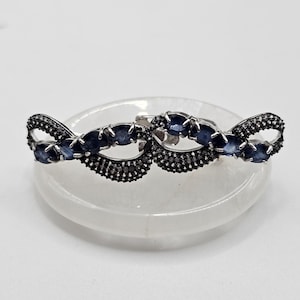 Elegant Natural White and Blue Sapphire Earrings – Sterling Silver Infinity Twist Design