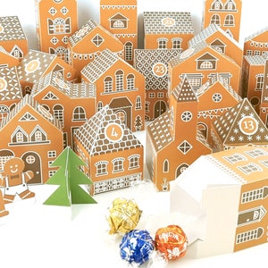 May include: A gingerbread house advent calendar with 24 numbered doors, each shaped like a small house. The houses are decorated with white icing and gingerbread details. There are also two gingerbread people and a small green Christmas tree.