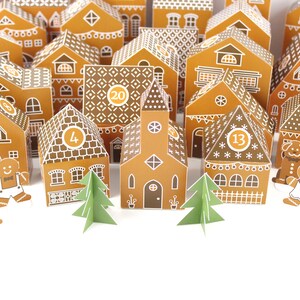May include: A gingerbread house advent calendar with 24 numbered doors, each with a different design. The houses are decorated with white frosting and candy. The calendar is perfect for counting down the days until Christmas.