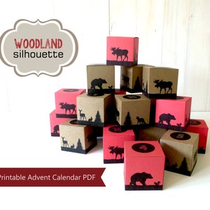 Set of 25 printable advent calendar boxes featuring silhouettes of woodland forest scenes