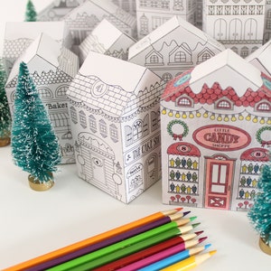 25 uniquely designed Victorian houses that are part of a printable advent calendar coloring set