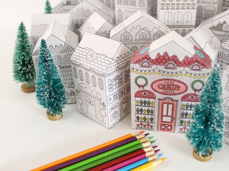 25 uniquely designed Victorian houses that are part of a printable advent calendar coloring set